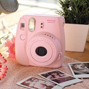 Pink instax mini Polaroid camera